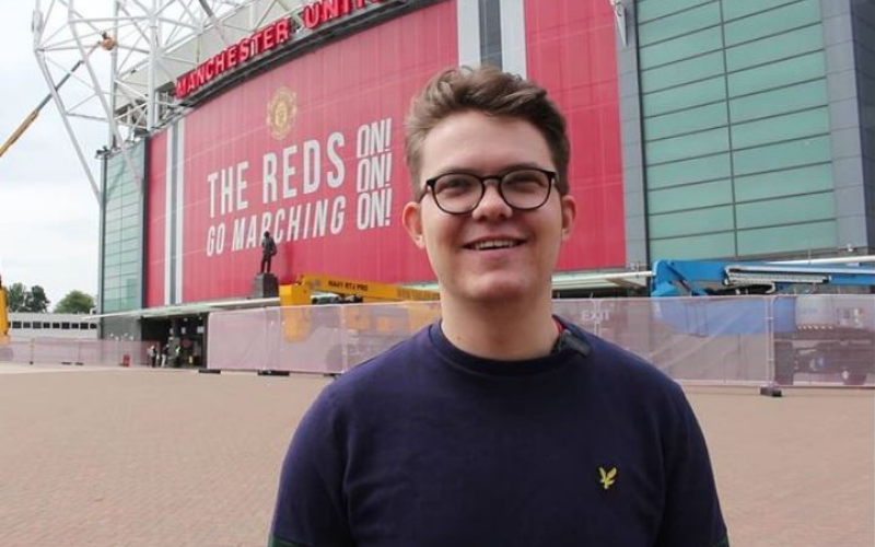 Will Evans in front of Old Trafford