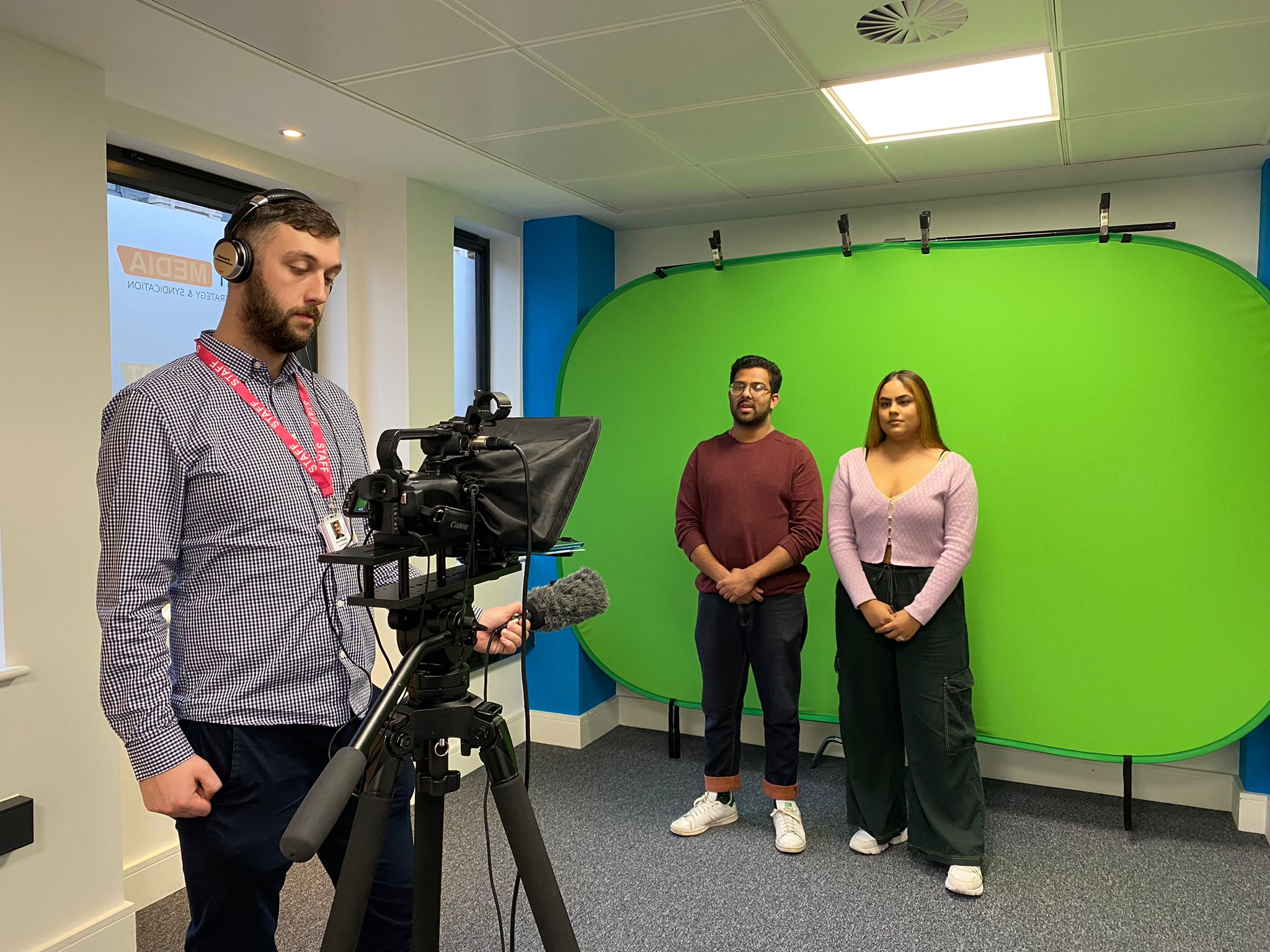 Trainees doing a green screen broadcast news bulletin