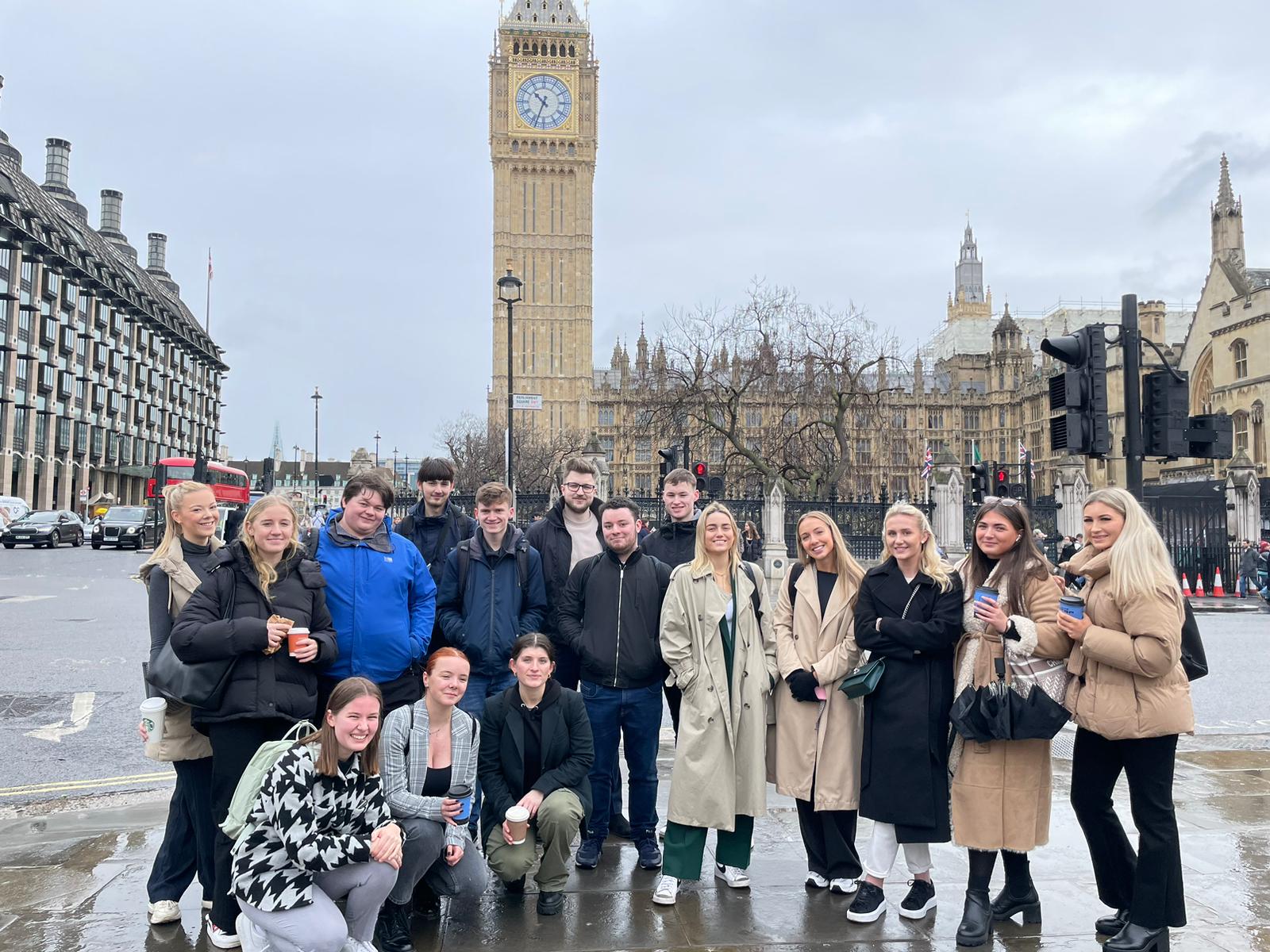 Our trainees are standing and smiling for a photo. Big Ben is in the background. 