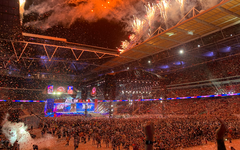 A photograph of a buzzing stadium for an AEW wrestling event in the UK.