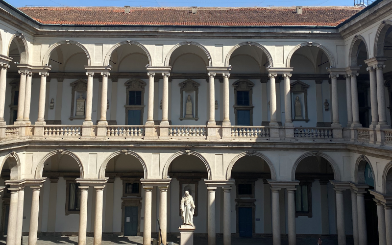 A museum with ancient roman architecture in Milan on a sunny day.